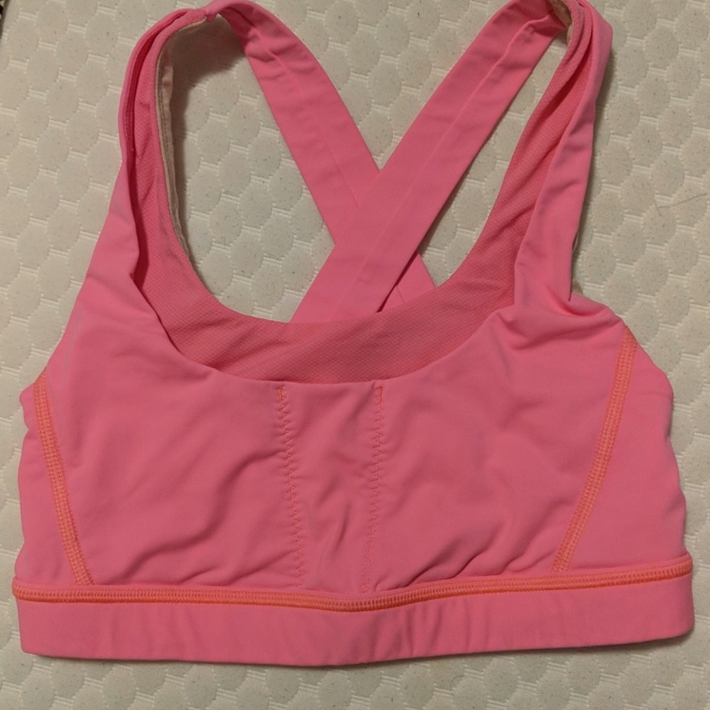 Hot pink Lululemon sports bra
